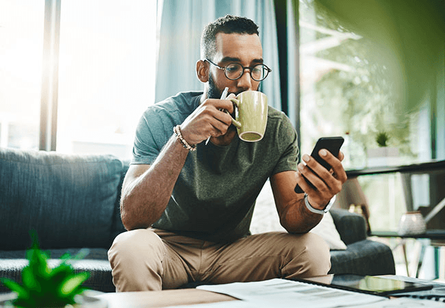 Man reviewing HR data on phone